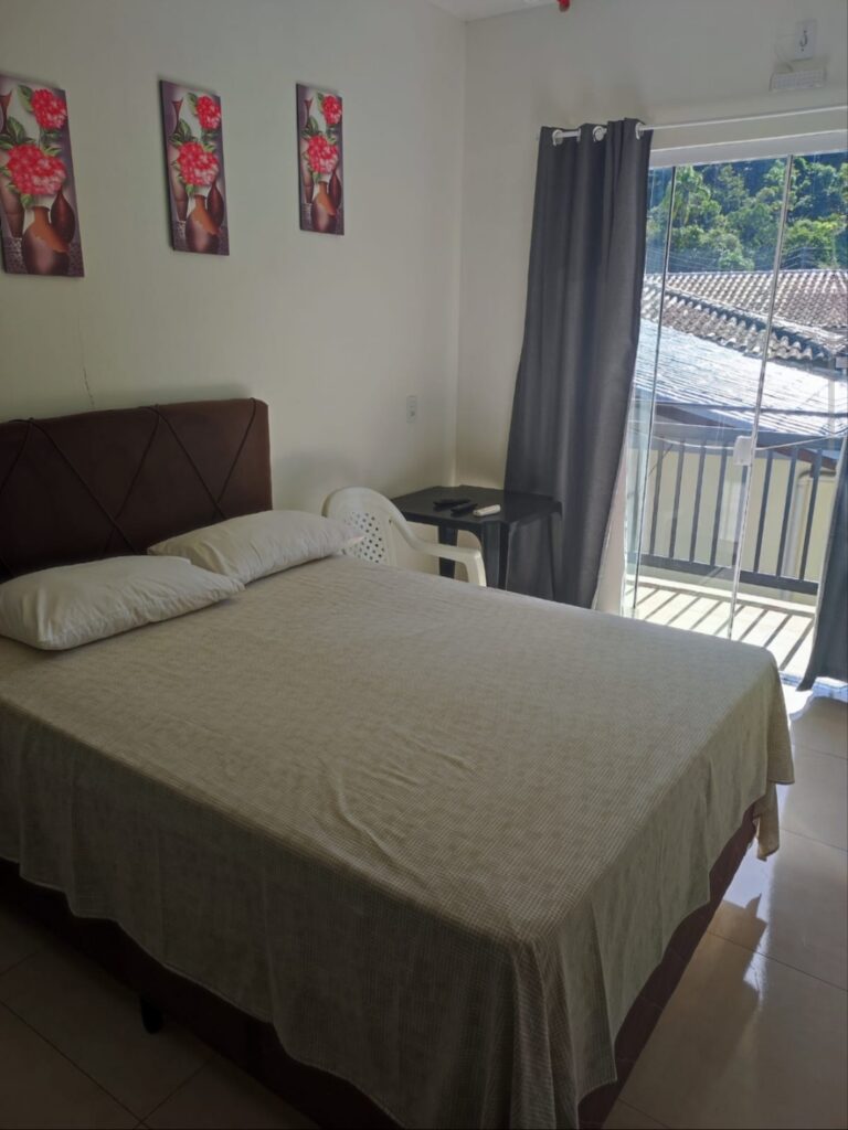 quarto quadruplo da pousada Casa Verde
